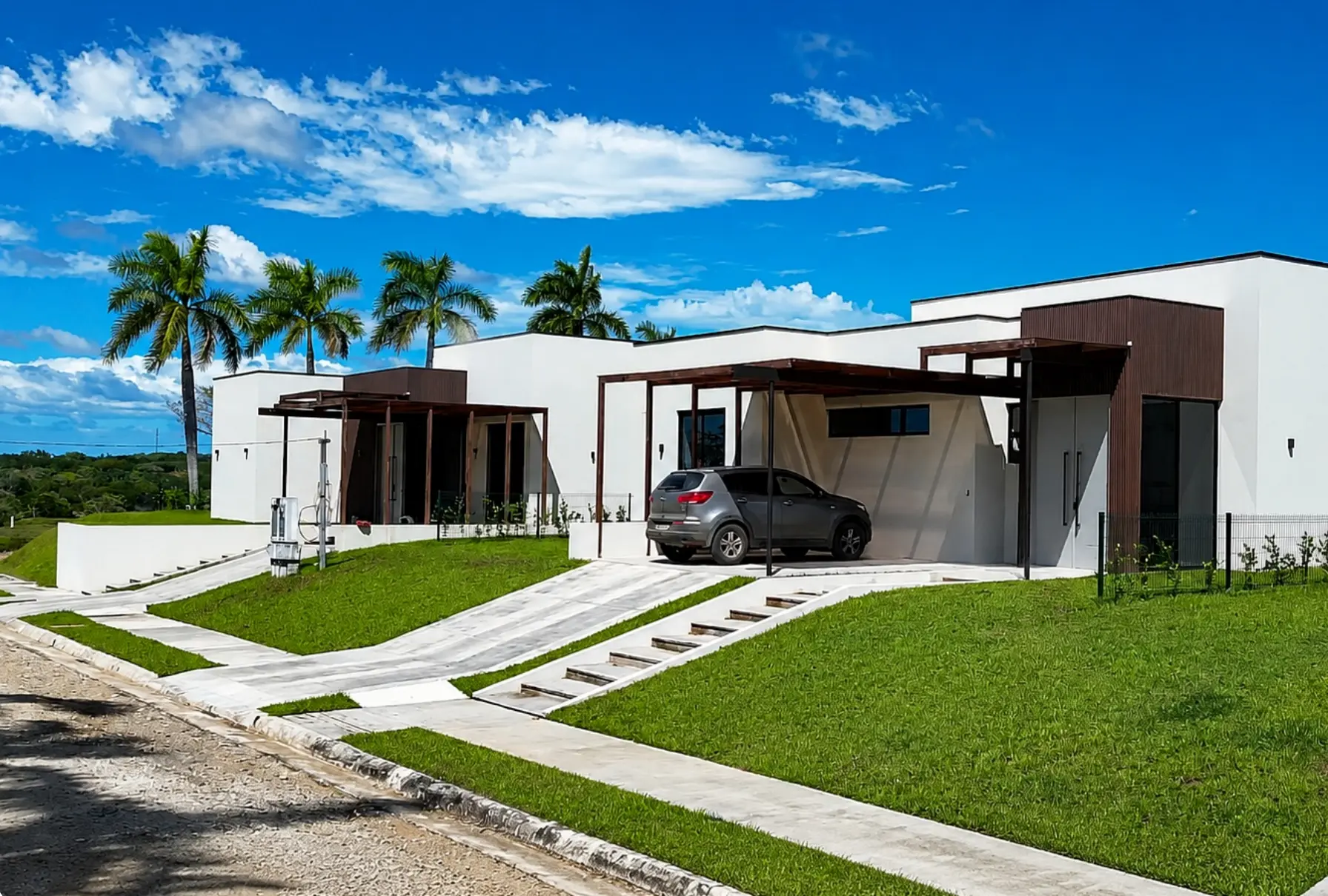Streetscape of a completed residence and paved walkways within the community