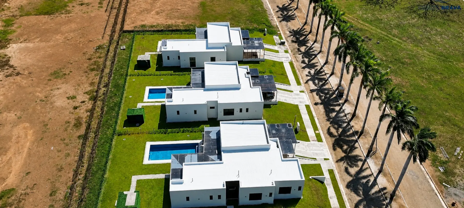 Aerial view of completed residences with private pools at Costa Brava