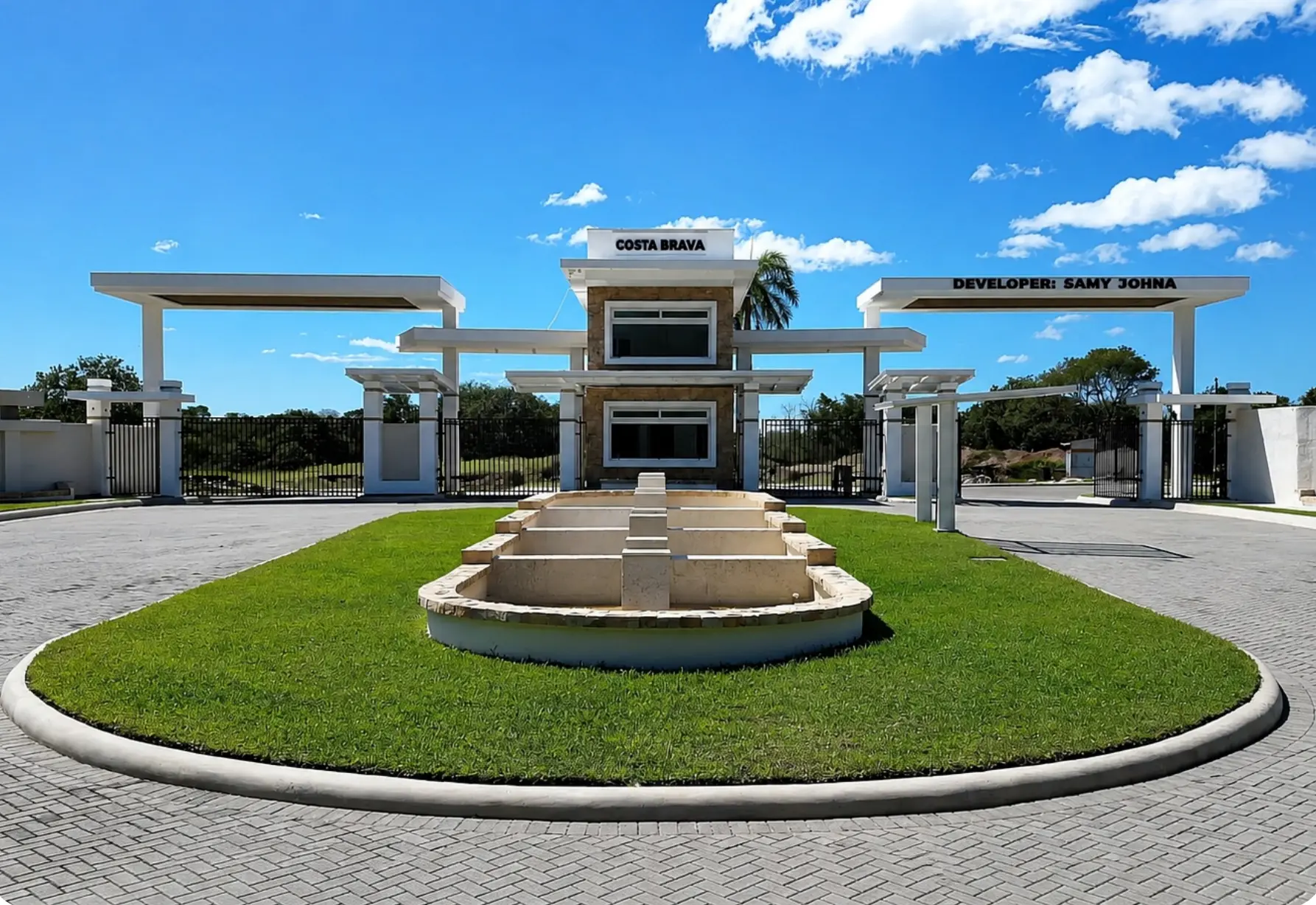 Ground-level view of the Costa Brava entrance gate and fountain court
