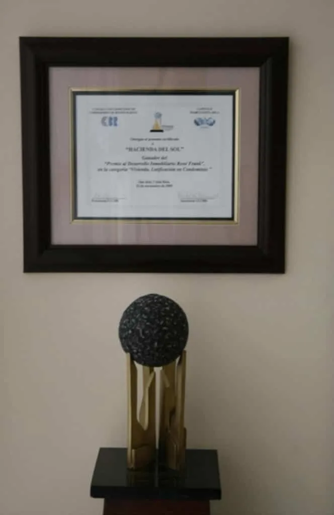 The Rene Frank Award certificate and trophy of the Chamber of Real Estate of Costa Rica